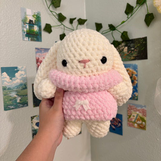 Handmade crochet bunny amigurumi plush in pink turtleneck